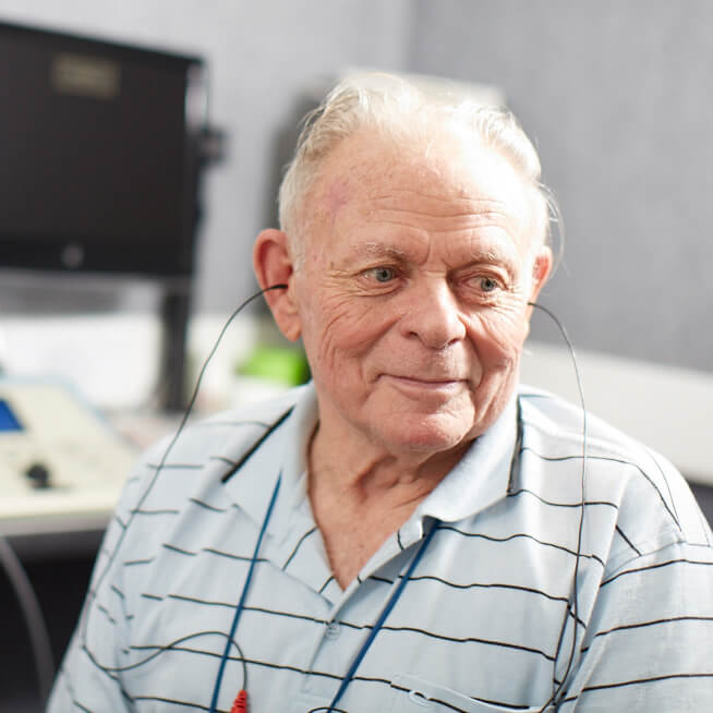 Elderly patient having a hearing test