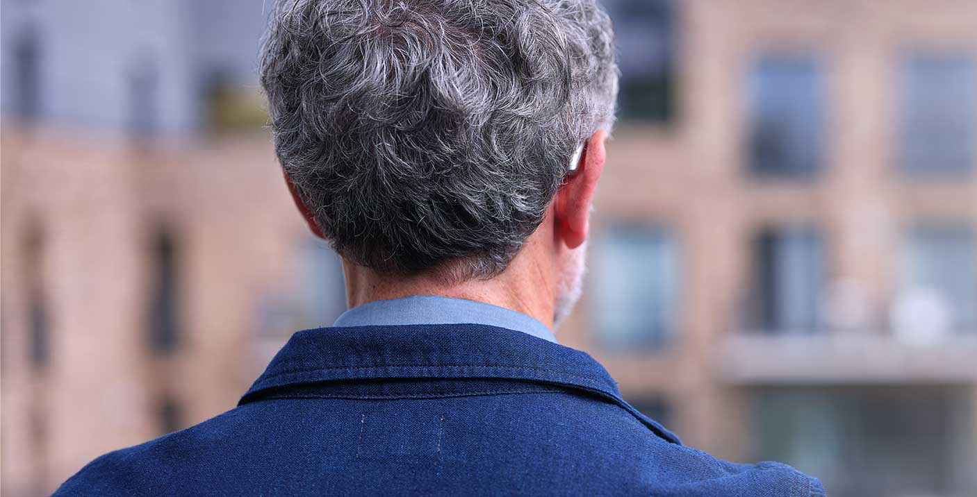 eon-man-from-back-hearing-aid-focus-discreet-flipped